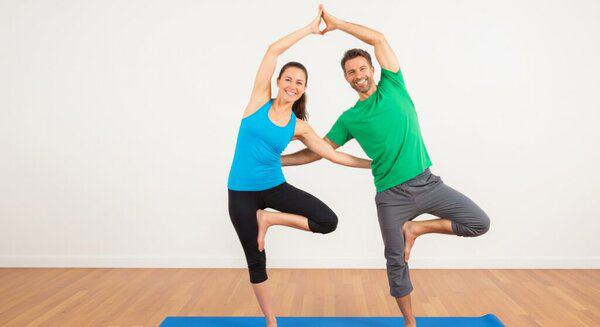 couple doing double tree pose
